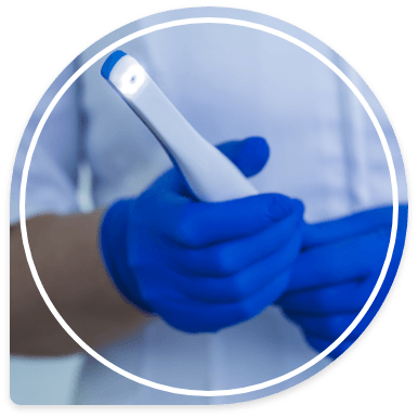 Two gloved hands holding a thin white intraoral camera