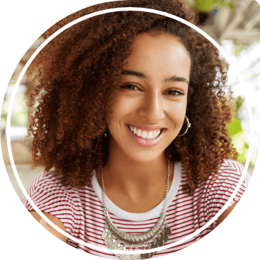 Smiling young woman in red and white striped shirt