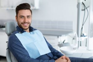 Man smiling at the dentist